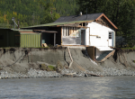 Provided by USGS of a home in Sutton, part of it destroyed by the Matanuska River.