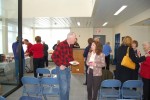 Well-wishers mingle at the ferry terminal building.